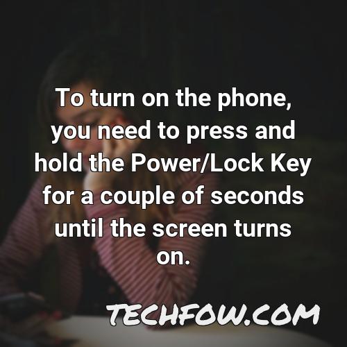 to turn on the phone you need to press and hold the power lock key for a couple of seconds until the screen turns on