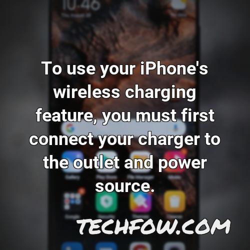 to use your iphone s wireless charging feature you must first connect your charger to the outlet and power source