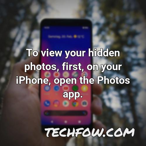 to view your hidden photos first on your iphone open the photos app