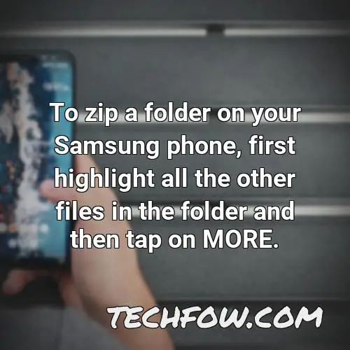 to zip a folder on your samsung phone first highlight all the other files in the folder and then tap on more