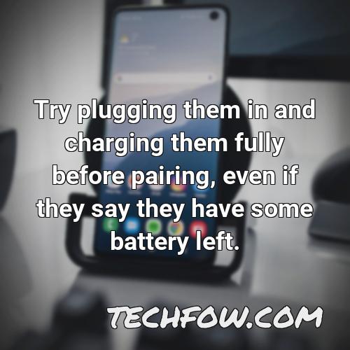 try plugging them in and charging them fully before pairing even if they say they have some battery left
