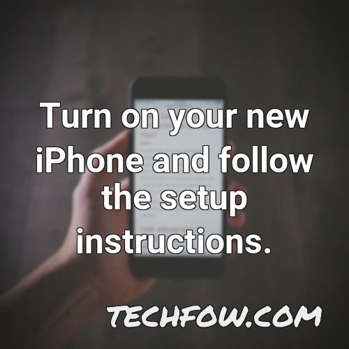 turn on your new iphone and follow the setup instructions