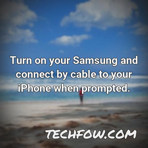 turn on your samsung and connect by cable to your iphone when prompted