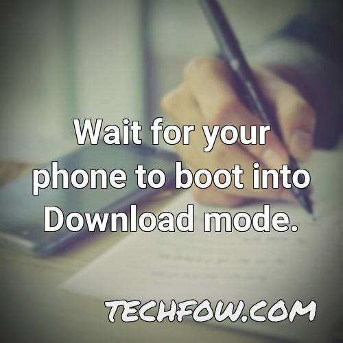 wait for your phone to boot into download mode
