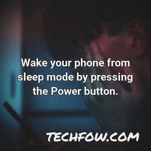 wake your phone from sleep mode by pressing the power button 1
