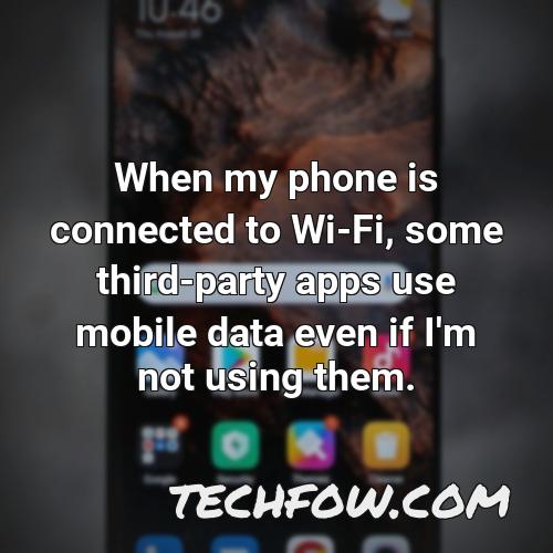 when my phone is connected to wi fi some third party apps use mobile data even if i m not using them
