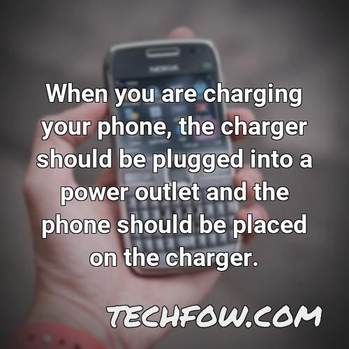 when you are charging your phone the charger should be plugged into a power outlet and the phone should be placed on the charger