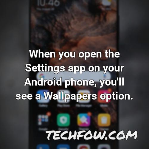 when you open the settings app on your android phone you ll see a wallpapers option