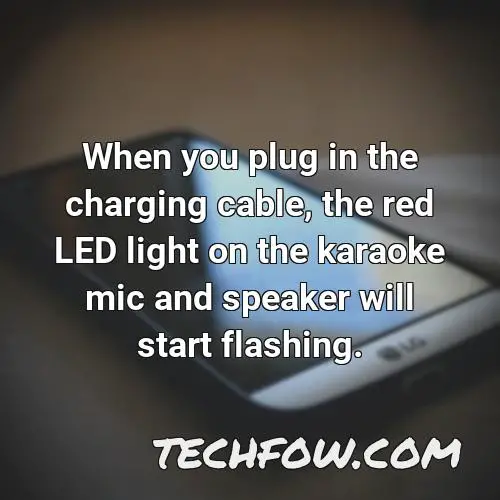 when you plug in the charging cable the red led light on the karaoke mic and speaker will start flashing