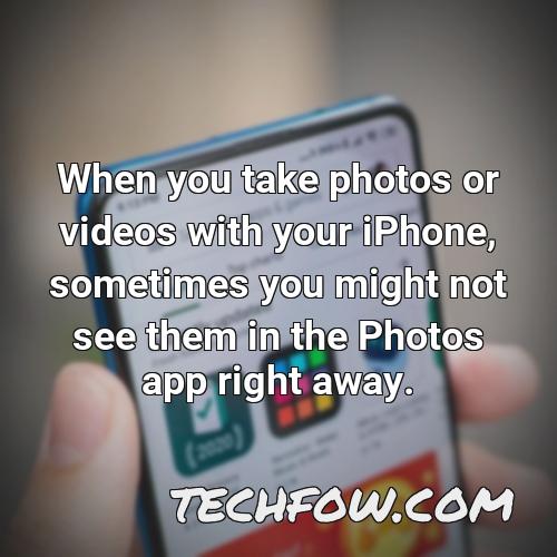 when you take photos or videos with your iphone sometimes you might not see them in the photos app right away