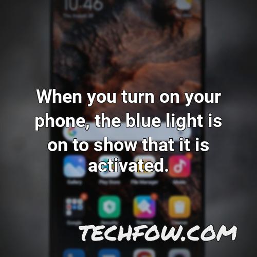 when you turn on your phone the blue light is on to show that it is activated