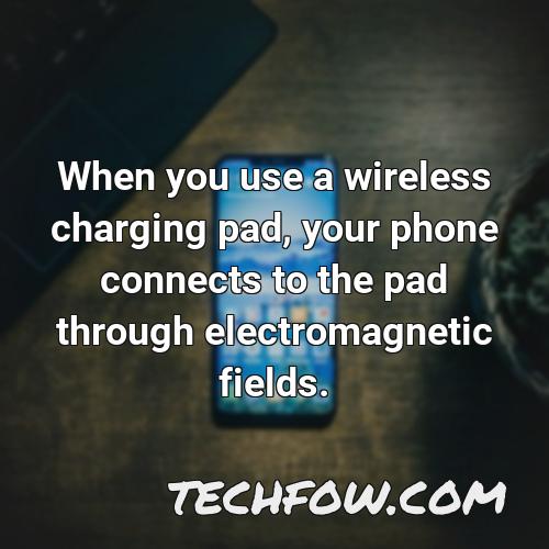 when you use a wireless charging pad your phone connects to the pad through electromagnetic fields