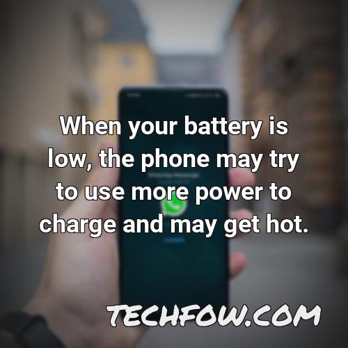 when your battery is low the phone may try to use more power to charge and may get hot