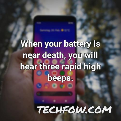 when your battery is near death you will hear three rapid high beeps