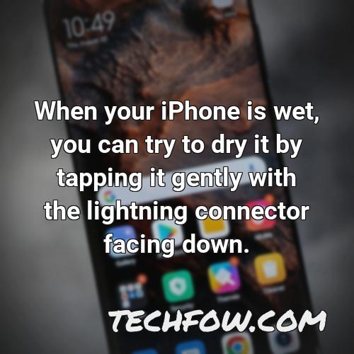 when your iphone is wet you can try to dry it by tapping it gently with the lightning connector facing down