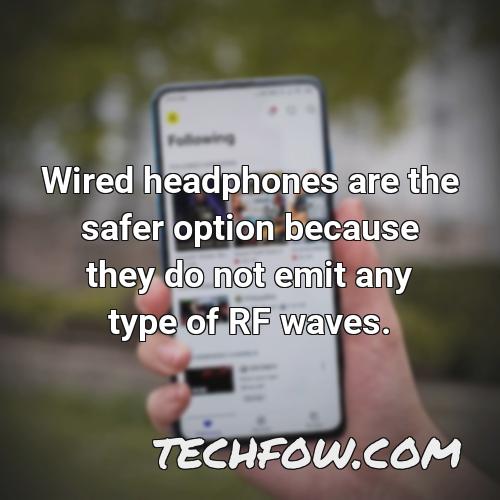 wired headphones are the safer option because they do not emit any type of rf waves