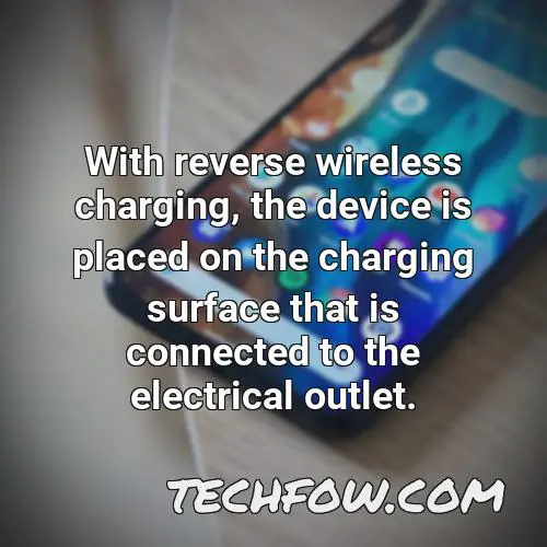 with reverse wireless charging the device is placed on the charging surface that is connected to the electrical outlet