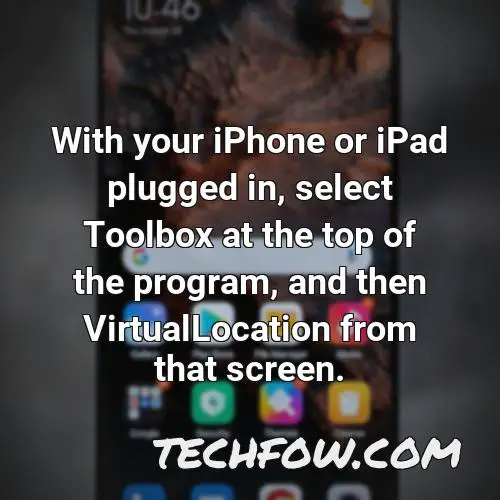with your iphone or ipad plugged in select toolbox at the top of the program and then virtuallocation from that screen