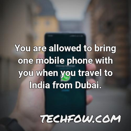 you are allowed to bring one mobile phone with you when you travel to india from dubai