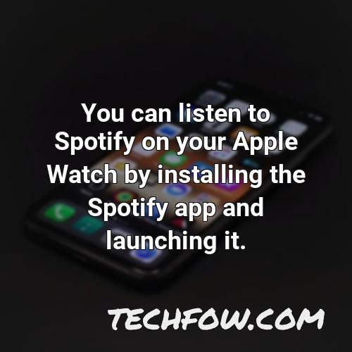 you can listen to spotify on your apple watch by installing the spotify app and launching it