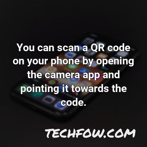 you can scan a qr code on your phone by opening the camera app and pointing it towards the code