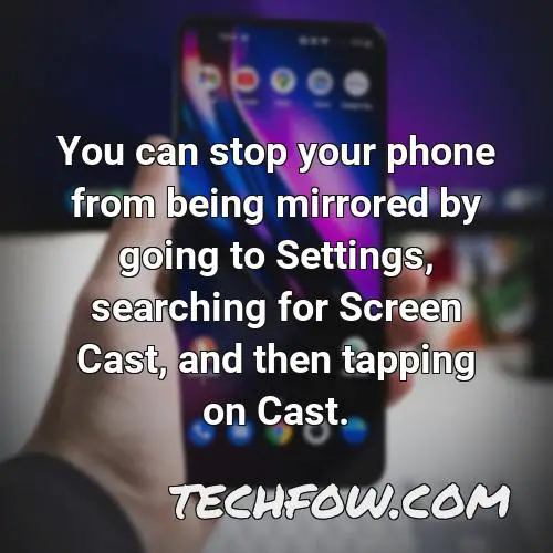 you can stop your phone from being mirrored by going to settings searching for screen cast and then tapping on cast