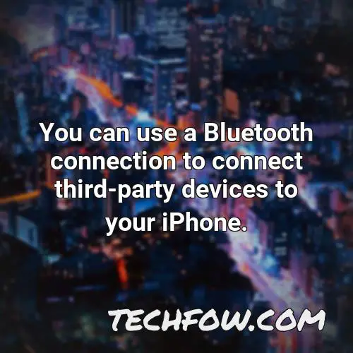 you can use a bluetooth connection to connect third party devices to your iphone