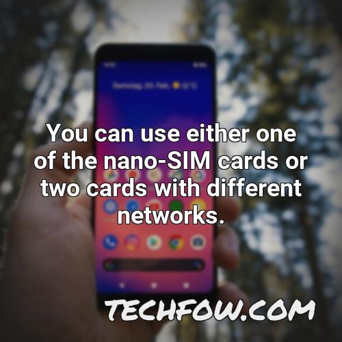 you can use either one of the nano sim cards or two cards with different networks