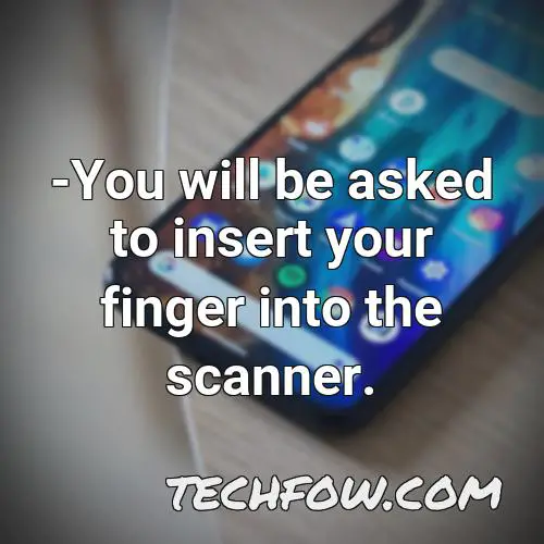 you will be asked to insert your finger into the scanner