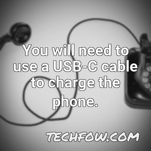 you will need to use a usb c cable to charge the phone