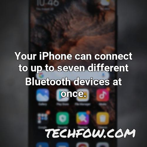 your iphone can connect to up to seven different bluetooth devices at once