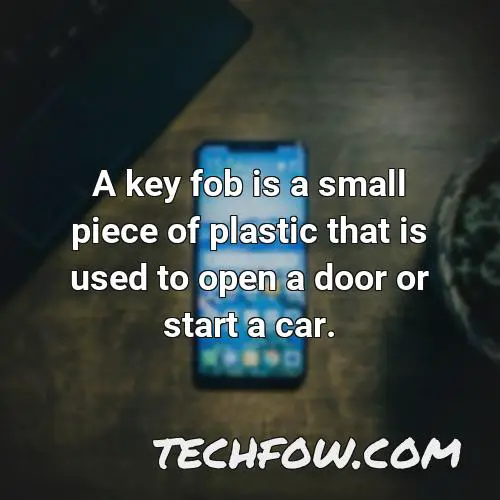 a key fob is a small piece of plastic that is used to open a door or start a car