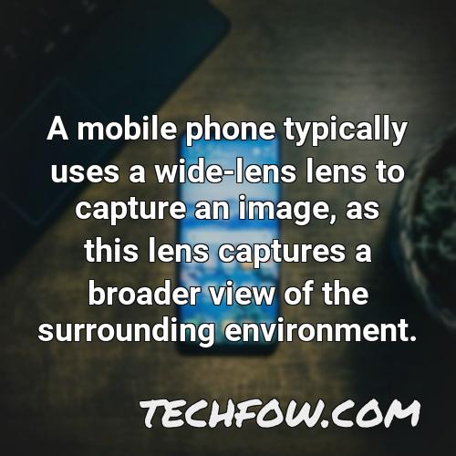 a mobile phone typically uses a wide lens lens to capture an image as this lens captures a broader view of the surrounding environment 1