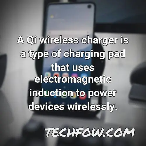 a qi wireless charger is a type of charging pad that uses electromagnetic induction to power devices wirelessly