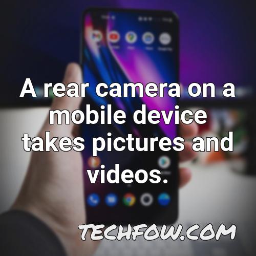 a rear camera on a mobile device takes pictures and videos