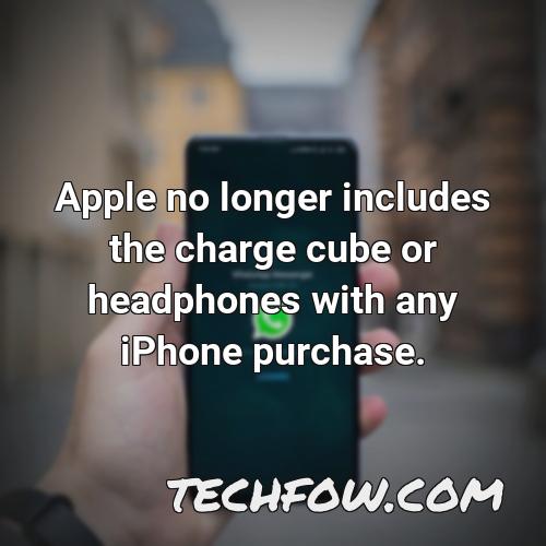 apple no longer includes the charge cube or headphones with any iphone purchase
