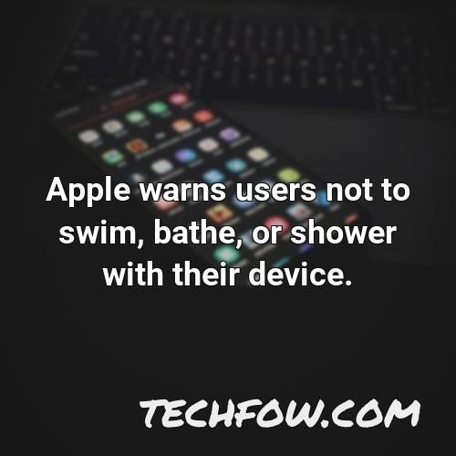 apple warns users not to swim bathe or shower with their device