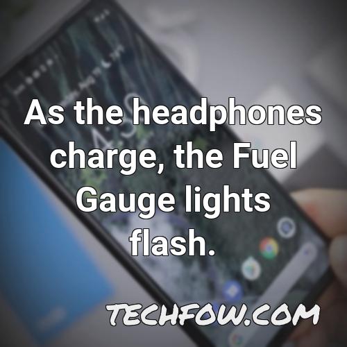 as the headphones charge the fuel gauge lights flash