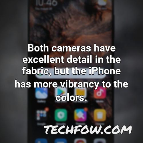 both cameras have excellent detail in the fabric but the iphone has more vibrancy to the colors