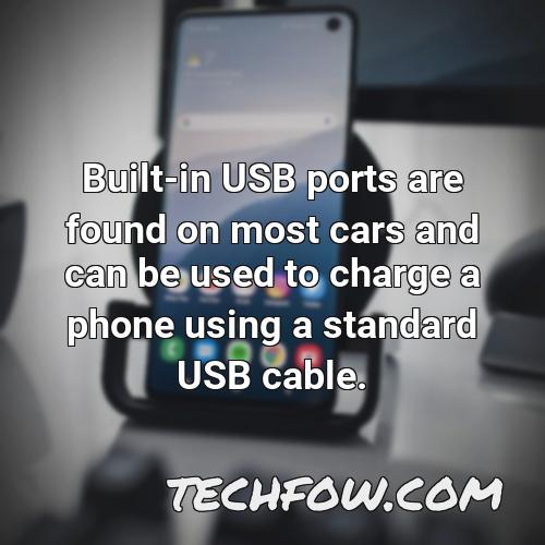 built in usb ports are found on most cars and can be used to charge a phone using a standard usb cable