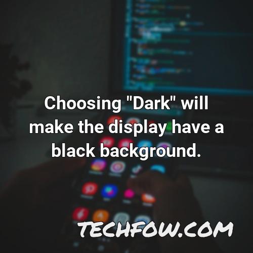 choosing dark will make the display have a black background