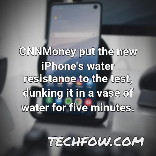 cnnmoney put the new iphone s water resistance to the test dunking it in a vase of water for five minutes