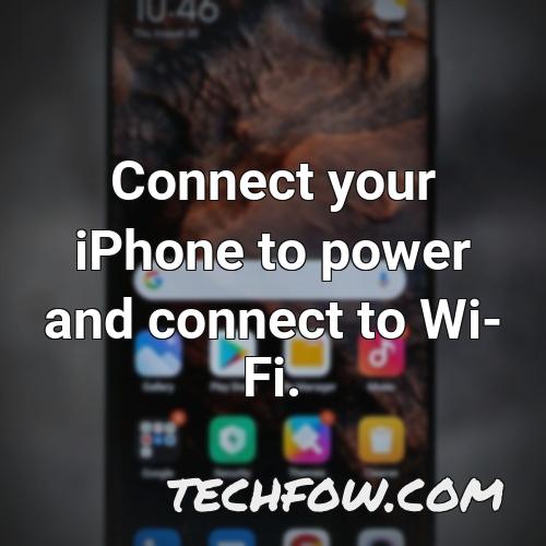 connect your iphone to power and connect to wi fi