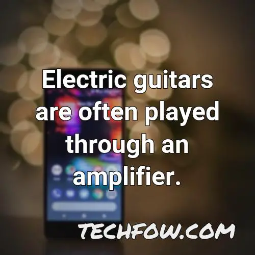 electric guitars are often played through an amplifier
