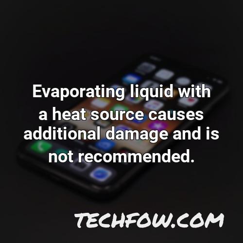 evaporating liquid with a heat source causes additional damage and is not recommended