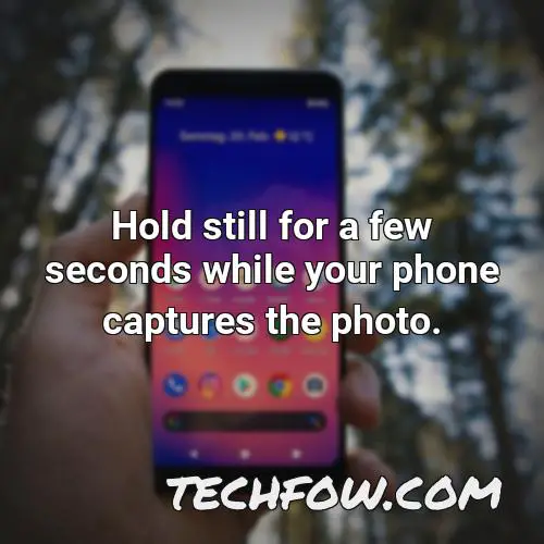 hold still for a few seconds while your phone captures the photo