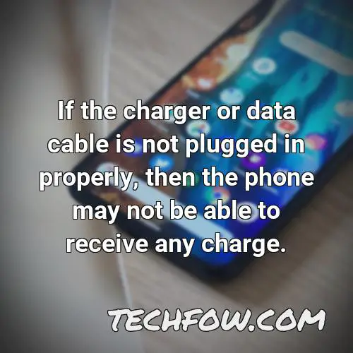 if the charger or data cable is not plugged in properly then the phone may not be able to receive any charge