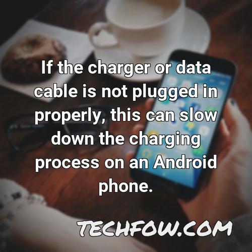 if the charger or data cable is not plugged in properly this can slow down the charging process on an android phone