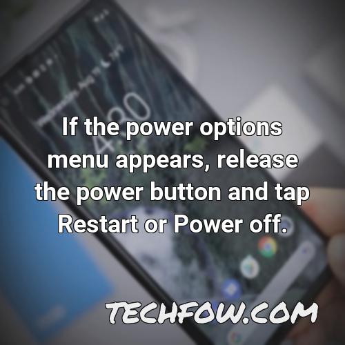 if the power options menu appears release the power button and tap restart or power off