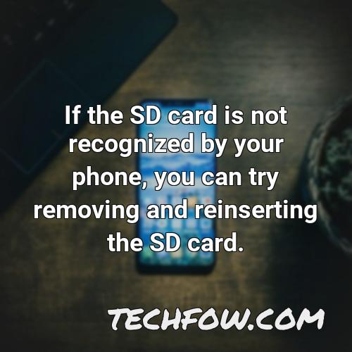 if the sd card is not recognized by your phone you can try removing and reinserting the sd card